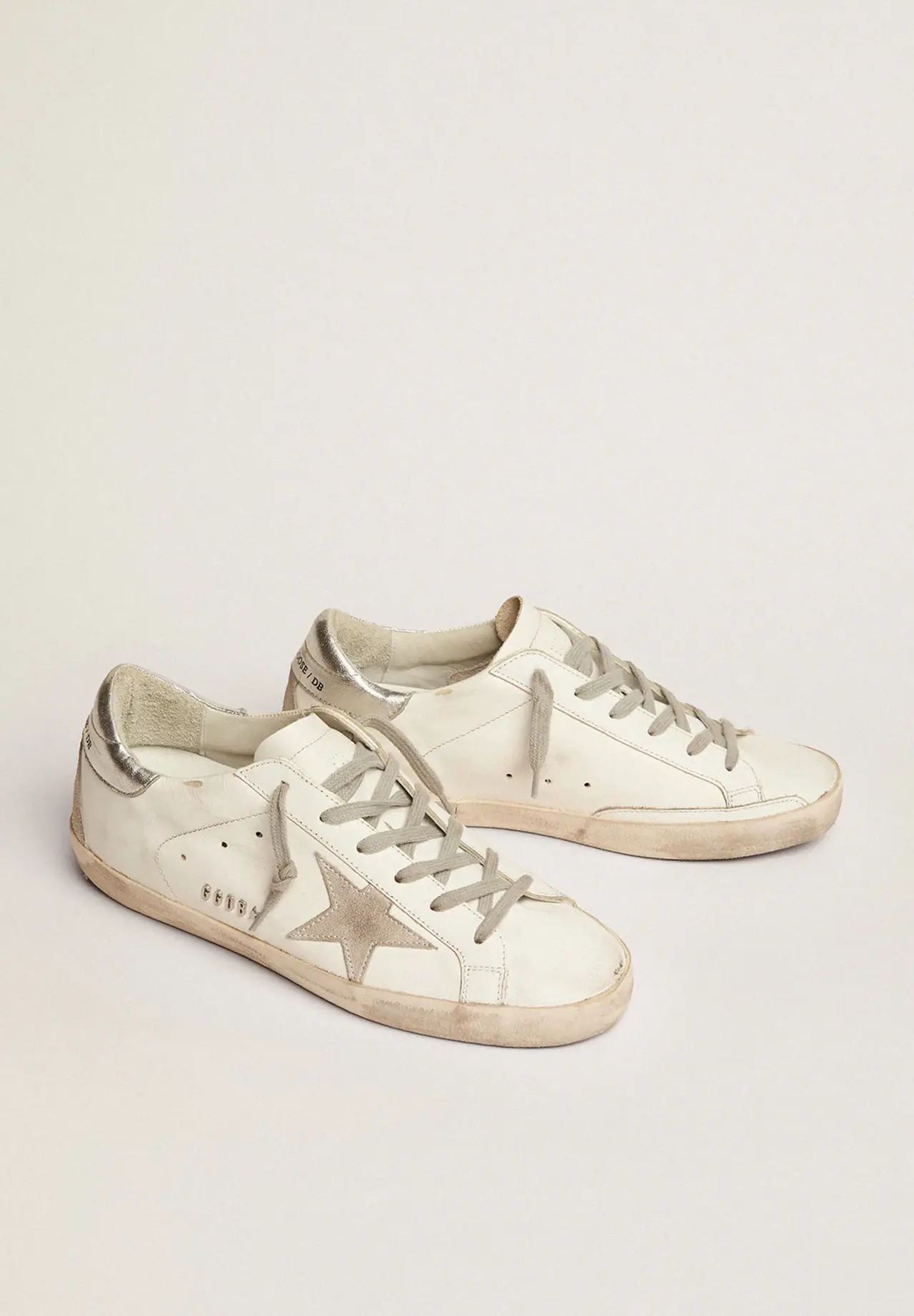 Super-Star sneakers with silver heel tab and metal studs lettering