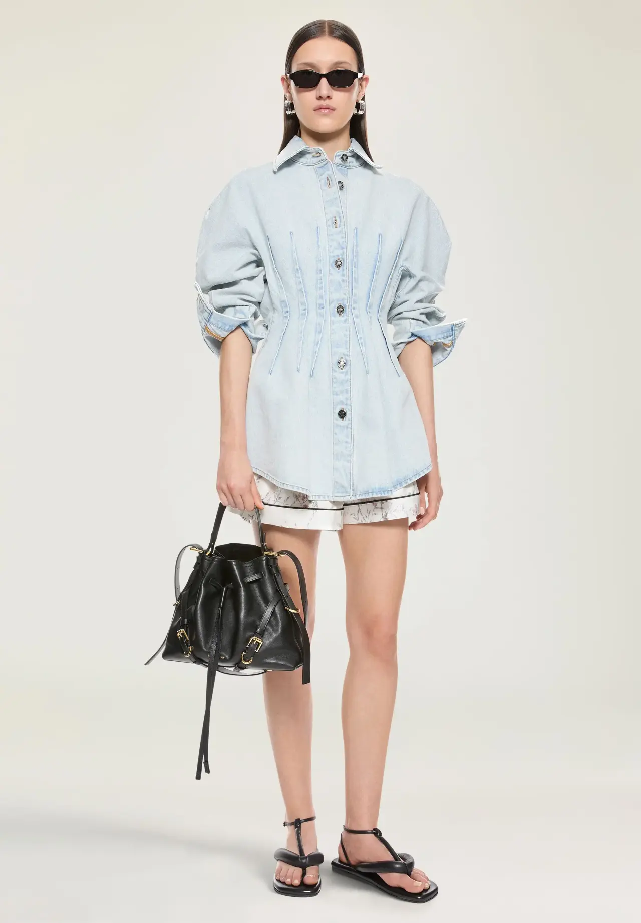 Small Voyou Bucket bag in shiny leather
