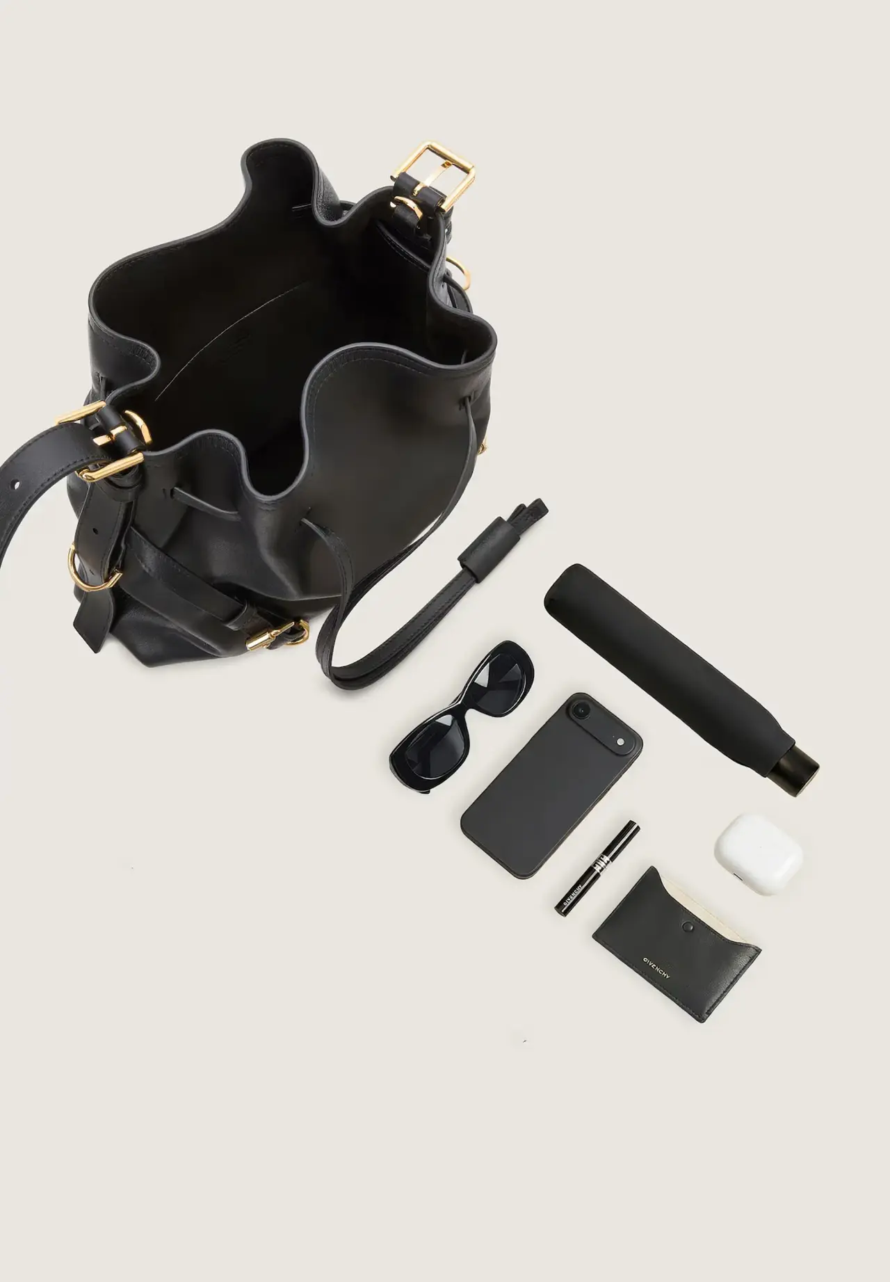 Small Voyou Bucket bag in shiny leather