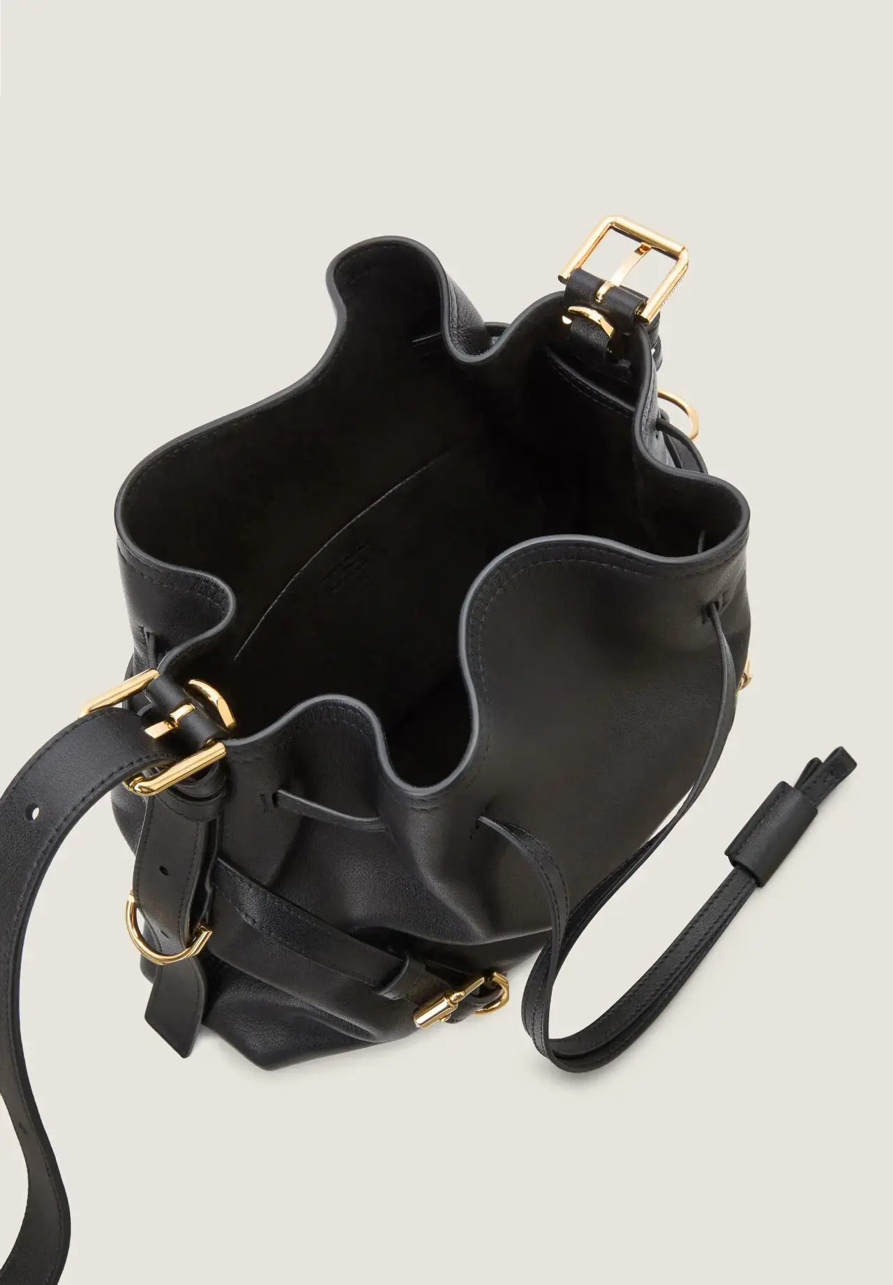 Small Voyou Bucket bag in shiny leather
