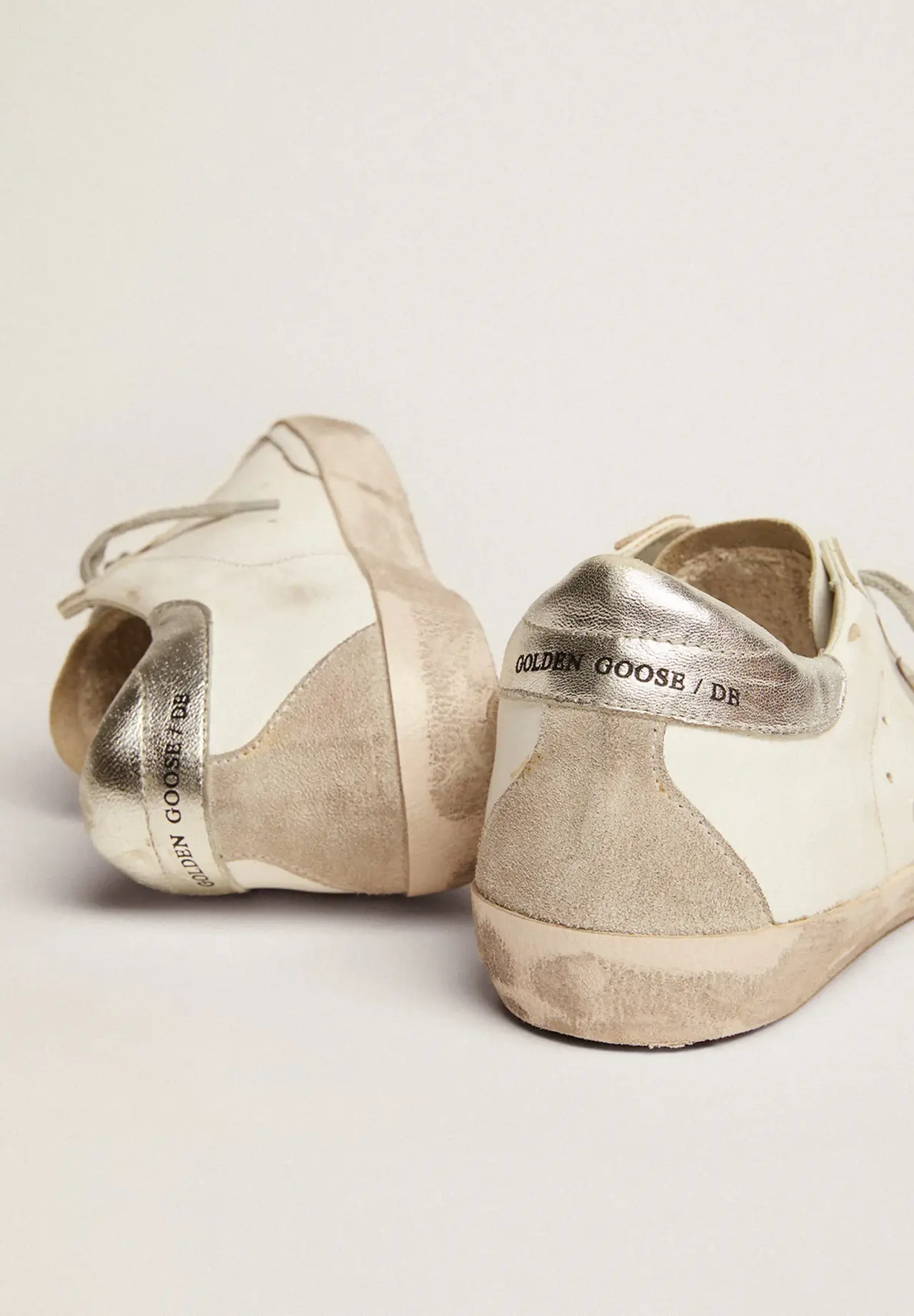 Super-Star sneakers with silver heel tab and metal studs lettering